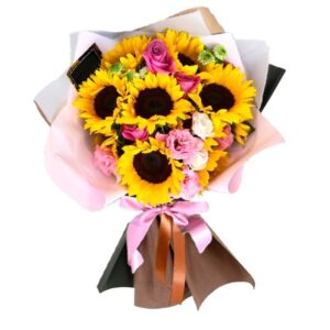 67 · Ramo de 10 Girasoles Más y Flores de Temporada en Tonos Rosadas